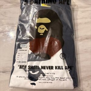 Bape Navy Blue Tee with Brown and Cream Ape Head Graphic